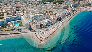 Aerial birds eye view drone photo of Elli beach on Rhodes city island, Dodecanese, Greece. Panorama with nice sand, lagoon and