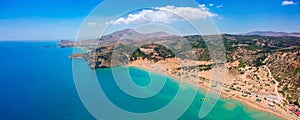 Aerial birds eye view drone photo Tsambika beach near Kolympia on Rhodes island, Dodecanese, Greece. Sunny panorama with sand