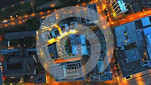 Aerial: birds view flight over Frankfurt am Main, Germany Skyline at night