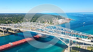 Aerial of the Blue Water Bridge and Lake Freighter in Sarnia, Canada photo