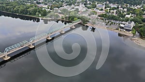 Aerial of bridge across the Delaware river in the historic city New Hope Pennsylvania and Lambertville New Jersey US