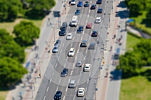 Aerial of busy road and sidewalk traffic with cars and people at Potsdamer Platz in Berlin