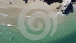 Aerial of Cabo ocean waters sandy beach coastline. Birds eye view. rising.