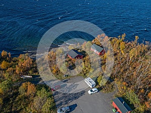 aerial Car Camping Caravan parking lake Abisko national park Bjoerkliden swedish lapland fall colors ruska indian summer