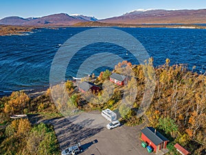 aerial Car Camping Caravan parking lake Abisko national park Bjoerkliden swedish lapland fall colors ruska indian summer