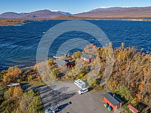 aerial Car Camping Caravan parking lake Abisko national park Bjoerkliden swedish lapland fall colors ruska indian summer