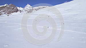 Aerial circular view solo trekker trek in Nepal mountains. Way to Tilicho lake in sunny weather conditions. Annapurna