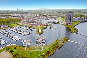 Aerial from the city and harbour in Almere in Netherlands photo