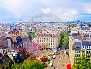 Aerial city view of beautiful buildings on horizon in spring in Paris,View on Eiffel Tower,Business Center La Defense,Paris,France