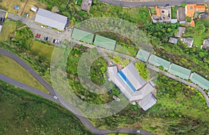 Aerial city view with buildings and parking lots