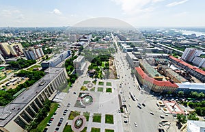 Aerial city view with crossroads and roads, houses buildings. Copter shot. Panoramic image.