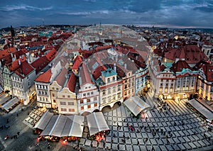 Aerial cityscape of Prague with colorful buildings at dusk photo