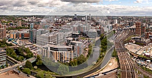 Aerial cityscape view of Leeds city centre and train station
