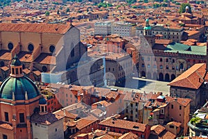 Aerial cityscape view from the tower on Bologna old town cente. Maggiore square and Basilica di San Petronio