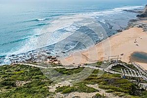 Aerial cliff and boardwalk view to Ribeira d`ilhas Beach, Ericeira World Surf Reserve - Mafra PORTUGAL photo
