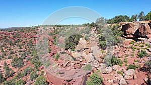 Aerial cliff southwest red rock beautiful desert Kanab Utah pull 4K