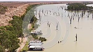 Aerial of Cliffs and Boathouses in Murray Darling basin river. South Australia