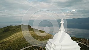 Aerial Close Unique Buddhist stupa historic monument symbol spire top mystical ritual costal Ogoi Island Lake Baikal