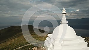 Aerial Close Unique Buddhist stupa historic monument symbol spire top mystical ritual costal Ogoi Island Lake Baikal