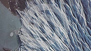 Aerial: Close up of Largest Glacier in Europe Vatnajokull. Beautiful glaciers flow through the mountains in Iceland.