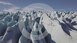 Aerial: Close up of Largest Glacier in Europe Vatnajokull. Beautiful glaciers flow through the mountains in Iceland. Concept