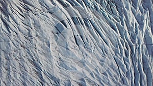 Aerial: Close up of Largest Glacier in Europe Vatnajokull. Beautiful glaciers flow through the mountains in Iceland. Concept