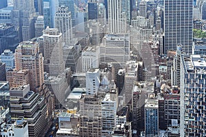 Aerial close up view of crowded buildings in New York City on a sunny day. Construction concept, crowded cities, and apartment