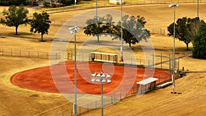 Aerial closeup baseball field with stadium lights