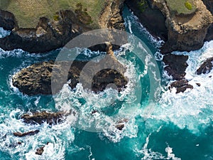 Aerial of Colorful Pacific Ocean and Rocky California Coast