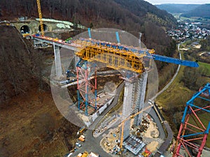 Aerial of a complex new railway bridge construction between two tunnels