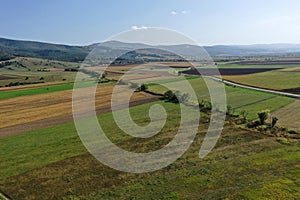 Aerial countryside view of agriculture fields, farmland, rural scenery by drone