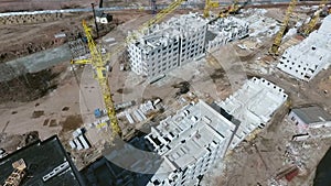 Aerial of creation of new city area with multistory apartment houses