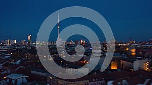 AERIAL: Day to Night Drone Hyper Lapse, Motion Time Lapse over Berlin with Alexanderplatz TV Tower view and beautiful