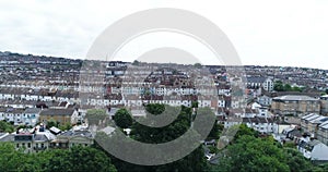 Aerial descending view of colourful Victorian houses in the town of Brighton England