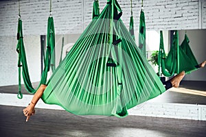 Aerial different inversion antigravity yoga with a hammock