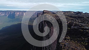 Aerial dolly out revealing majestic Tepuy Roraima plateau at day time. Venezuela