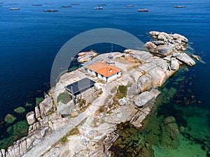 aerial dron view of Punta Cabalo Lighthouse in Arousa Island, Spain. photo