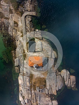 aerial dron view of Punta Cabalo Lighthouse in Arousa Island, Spain. Vertical photo photo