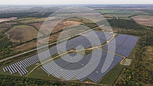 Aerial dron view of solar power station. Top View of Solar Farm. Renewable Energy concept. Aerial shot of Solar Power Station. 4k