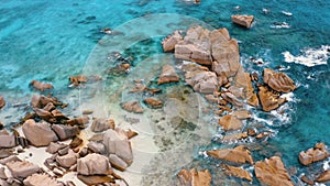 Aerial drone 4k top-down footage of Seychelles most hidden idyllic tropical beach Anse Marron at La Digue island.