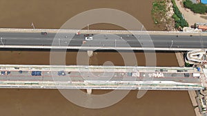 Aerial drone above a bridge with one lane under construction