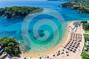 Aerial drone bird`s eye view of of Agia Paraskeui Beach with turquoise sea in complex islands in Parga area, Ionian sea, Epirus,