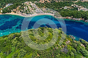 Aerial drone bird`s eye view of of Agia Paraskeui Beach with turquoise sea in complex islands in Parga area, Ionian sea, Epirus,