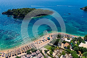 Aerial drone bird`s eye view of of Agia Paraskeui Beach with turquoise sea in complex islands in Parga area, Ionian sea, Epirus,