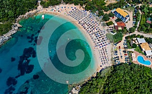 Aerial drone bird`s eye view of Sarakiniko Beach with turquoise sea in Parga area, Ionian sea, Epirus, Greece