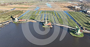 Aerial drone birds eye view on one of the wind mills of Zaanse Schans in The Netherlands. Representing dutch historic