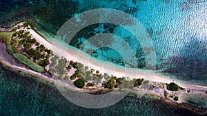Aerial drone birds eye view of tropical island.