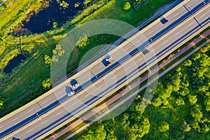 Aerial Drone Flight top down View of freeway busy city rush hour heavy traffic jam highway. Aerial view of the vehicular