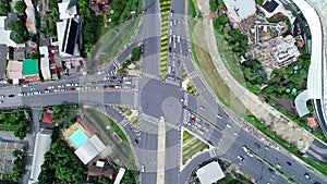 Aerial Drone Flight View of vehicular intersection with cars on the road and tunnel under asphalt road in Phuket thailand