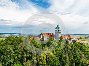 Aerial drone fly near Smolenice castle, Slovakia. Trnava region, Litle Carpathians